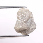 Natural gray diamond ring featuring salt and pepper inclusions and minimalist design