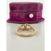 Classic lab grown diamond solitaire ring with round brilliant cut stone in gold band