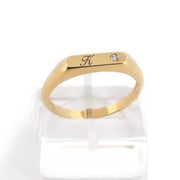 Dainty personalized gold ring with alphabet initial in classic signet style for modern women