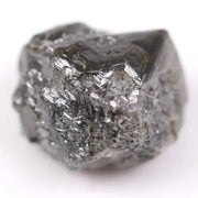 Natural black diamond ring featuring a faceted stone in a rose gold 