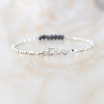 bracelet gold and with Black diamond uncut and uncut Black diamond luxury jewelry display.