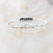 bracelet gold and with Black diamond uncut and uncut Black diamond luxury jewelry display.