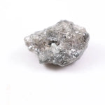 Salt and pepper diamond ring showcasing raw gray diamond texture and unique inclusions