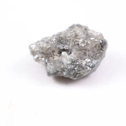 Salt and pepper diamond ring showcasing raw gray diamond texture and unique inclusions