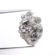 Salt and pepper diamond ring showcasing raw gray diamond texture and unique inclusions