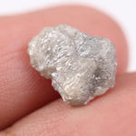 Natural gray diamond ring featuring salt and pepper inclusions and minimalist design