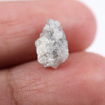 Natural gray diamond ring featuring salt and pepper inclusions and minimalist design
