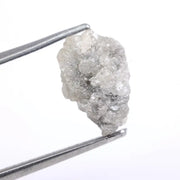 Natural gray diamond ring featuring salt and pepper inclusions and minimalist design