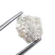 Custom white diamond ring with emerald cut stone set in a handcrafted bridal design.