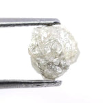 Custom white diamond ring with emerald cut stone set in a handcrafted bridal design.