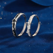 Matching gold and silver couple rings, versatile design for everyday wear.