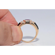 Modern lab created gemstone ring with aquamarine center and brilliant white diamonds
