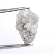 Natural gray diamond ring featuring salt and pepper inclusions and minimalist design