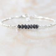 bracelet gold and with Black diamond uncut and uncut Black diamond luxury jewelry display.