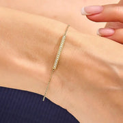 ruby tennis bracelet paired with diamond bracelets womens fashion jewelry and sparkling luxury finish.