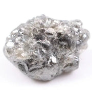 Salt and pepper diamond ring showcasing raw gray diamond texture and unique inclusions