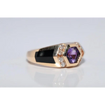 Modern lab created gemstone ring with aquamarine center and brilliant white diamonds
