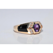 Modern lab created gemstone ring with aquamarine center and brilliant white diamonds
