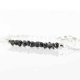 silver bracelets inspired by raw Black diamond rock and rough diamond gemstone.