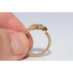 Delicate lab grown ring with round cut diamond in classic solitaire gold setting for her everyday elegance