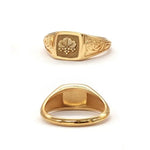 Elegant dainty gold initial ring with custom alphabet engraving in a sleek and stylish signet design