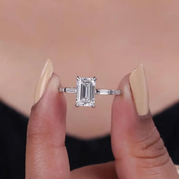 moonstone engagement ring paired with vintage gold ring and antique cushion cut diamond accents.