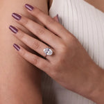 Round diamond engagement ring with classic brilliant luxury setting