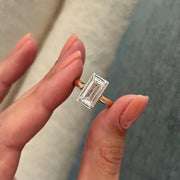 2 carat baguette cut diamond ring in white gold with sleek rectangular center stone and side accents