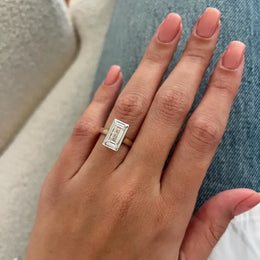 2 carat baguette cut diamond ring in white gold with sleek rectangular center stone and side accents