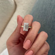 2 carat baguette cut diamond ring in white gold with sleek rectangular center stone and side accents