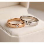 Rose gold couple rings with engraved infinity symbols, eternal love gift.