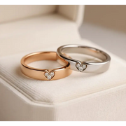 Rose gold couple rings with engraved infinity symbols, eternal love gift.