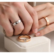 Rose gold couple rings with engraved infinity symbols, eternal love gift.