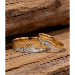 Modern couple rings with sleek band and diamond accents for stylish pairs.
