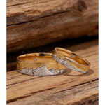 Modern couple rings with sleek band and diamond accents for stylish pairs.