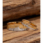 Modern couple rings with sleek band and diamond accents for stylish pairs.