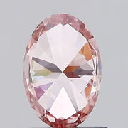  vivid pink colour diamond lab grown diamond with brilliant facets on a light gray background.
