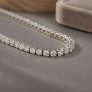 beautiful necklace gold with gold flower necklace detailing and sparkling feminine jewelry design.
