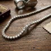 beautiful necklace gold with gold flower necklace detailing and sparkling feminine jewelry design.