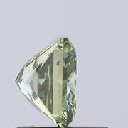 vivid green colour diamond princess cut green lab grown diamond with sharp facets on a light gray background.