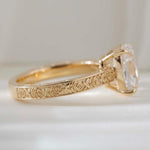 Elongated cushion cut lab grown diamond ring with vintage engraved gold band