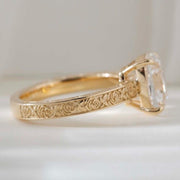 Elongated cushion cut lab grown diamond ring with vintage engraved gold band