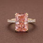 Radiant cut peach pink diamond ring with 14K gold pave band
