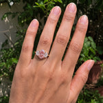 3 stone oval engagement ring with elegant diamond setting