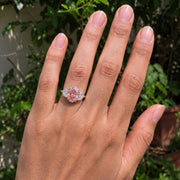 3 stone oval engagement ring with elegant diamond setting