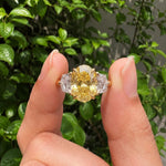 yellow oval cut diamond ring with baguette side stones in gold
