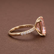 Radiant cut peach pink diamond ring with 14K gold pave band