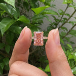 Radiant cut peach pink diamond ring with 14K gold pave band