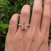 Radiant cut peach pink diamond ring with 14K gold pave band