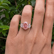 3 stone oval engagement ring with elegant diamond setting